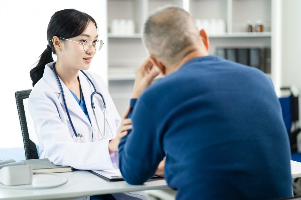 female doctor consulting patient using x ray film analyzed the r